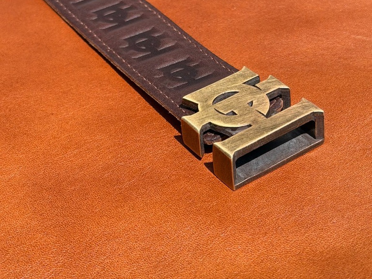 Premium branded belt hardware detail